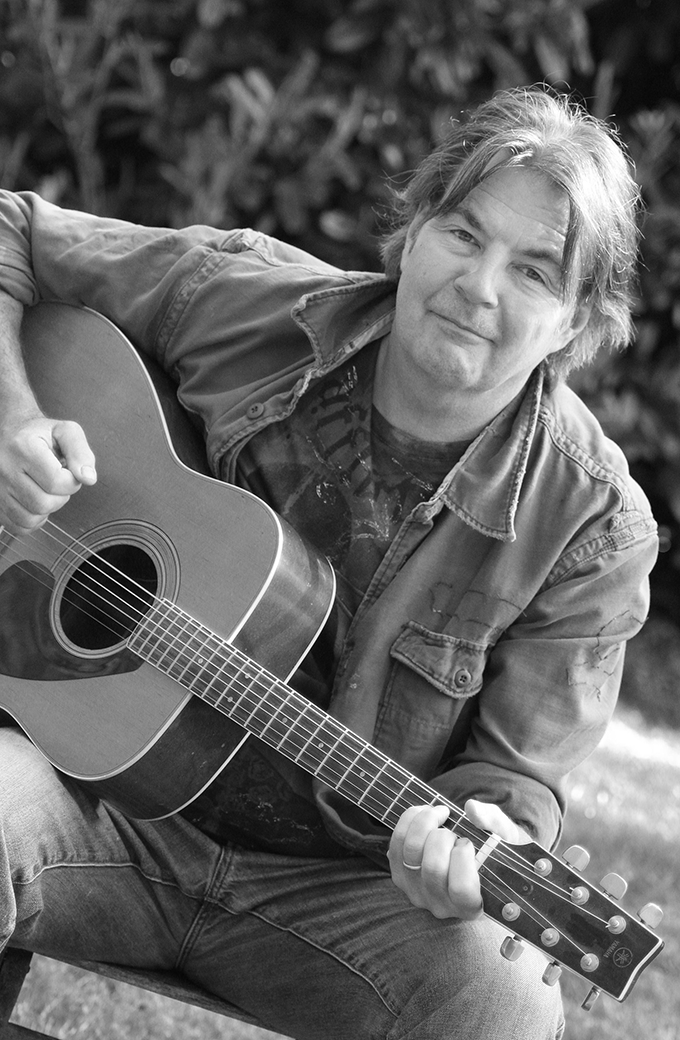 Sean Davison with guitar